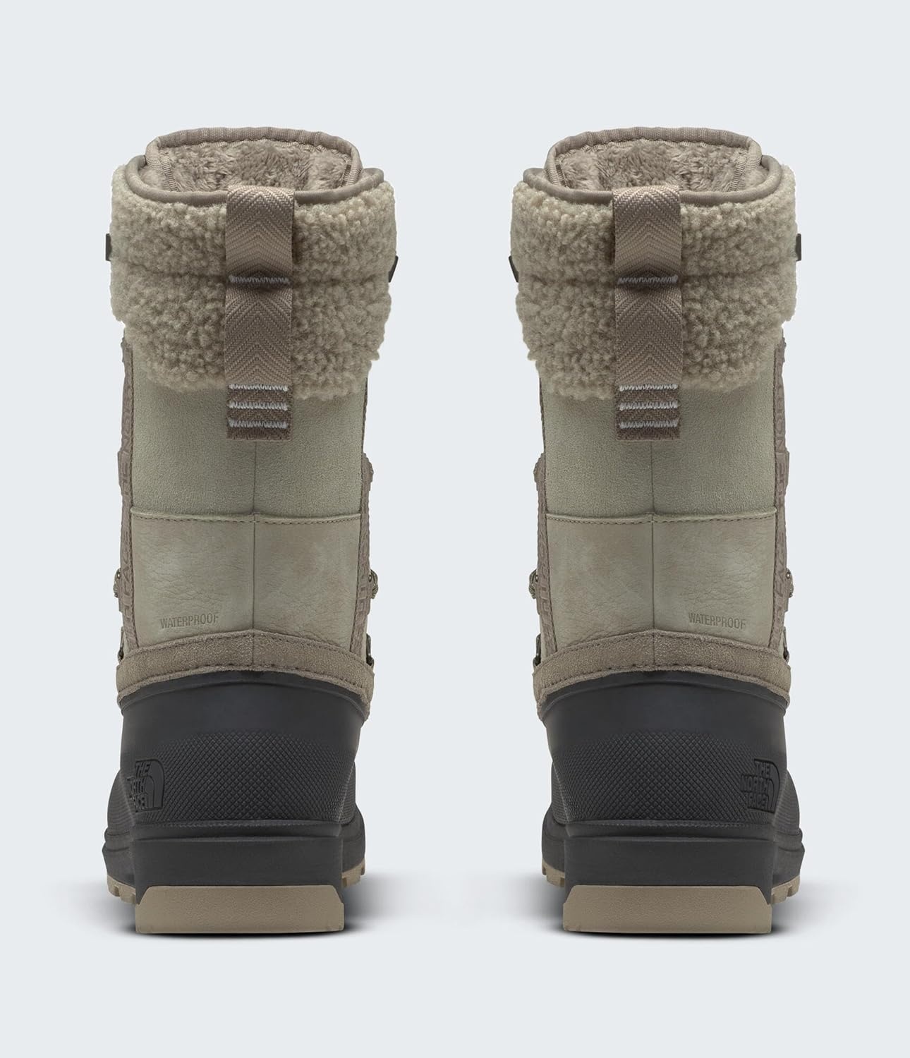 imageThe North Face Womens Shellista V Mid Insulated Waterproof Snow Boot Molded 45 Mm Lugs Rubber OutsoleClay GreyTnf Black