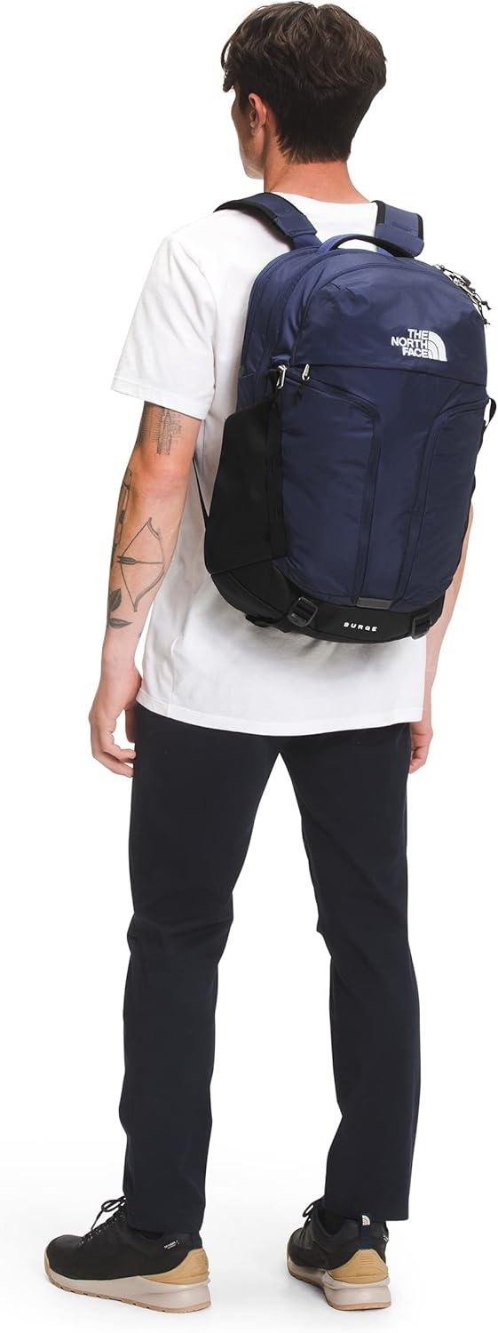 imageTHE NORTH FACE Surge Commuter Laptop Backpack Daypack With Water Repellent Finish 16 Laptop Sleeve Reflective DetailsTnf NavyTnf Black