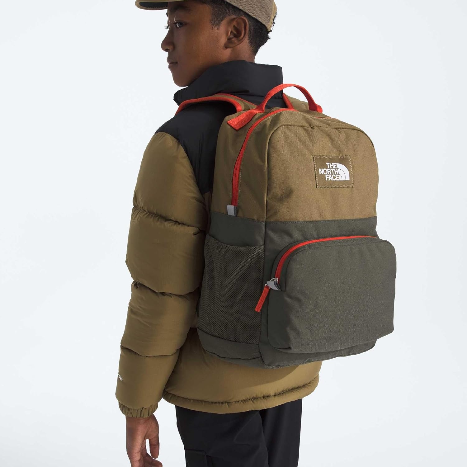 imageTHE NORTH FACE Teen Chuckwalla Daypack Travel Backpack Laptop Sleeve Reflective Safety Details Adjustable Strap Metal PinkTranscendent GreyPale Blossom One SizeCedarNew Taupe GreenLava Red