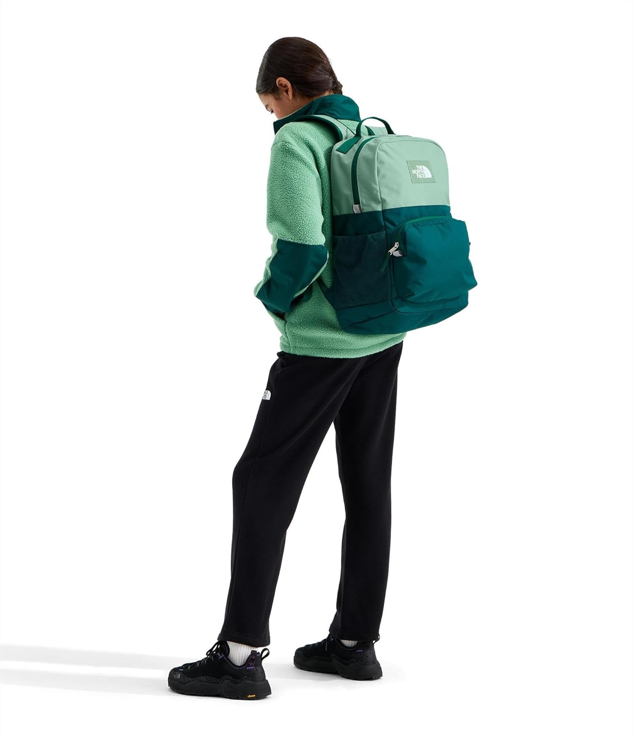 imageTHE NORTH FACE Teen Chuckwalla Daypack Travel Backpack Laptop Sleeve Reflective Safety Details Adjustable Strap Metal PinkTranscendent GreyPale Blossom One SizePacific TealSlate MossEvergreen