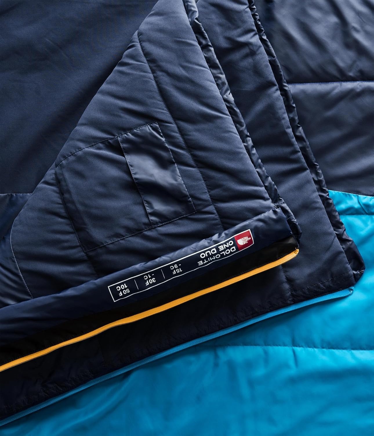 imageThe North Face SleepingBags Dolomite One 15F 9C 3in1 Insulated Sleeping Bag for 2 People Water Repellent Rectangular Shape Fleece Lined Mid LayerHyper BlueRadiant YellowNPF
