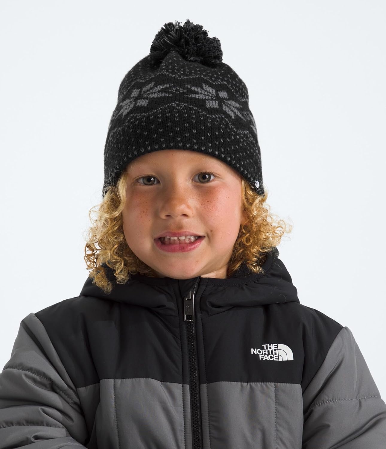 image:imageTHE NORTH FACE Kids Cabin Ski Tuke Winter Hat With Novelty Jacquard Graphic Sustainable Fabric Removable PomTnf Black Jacquard
