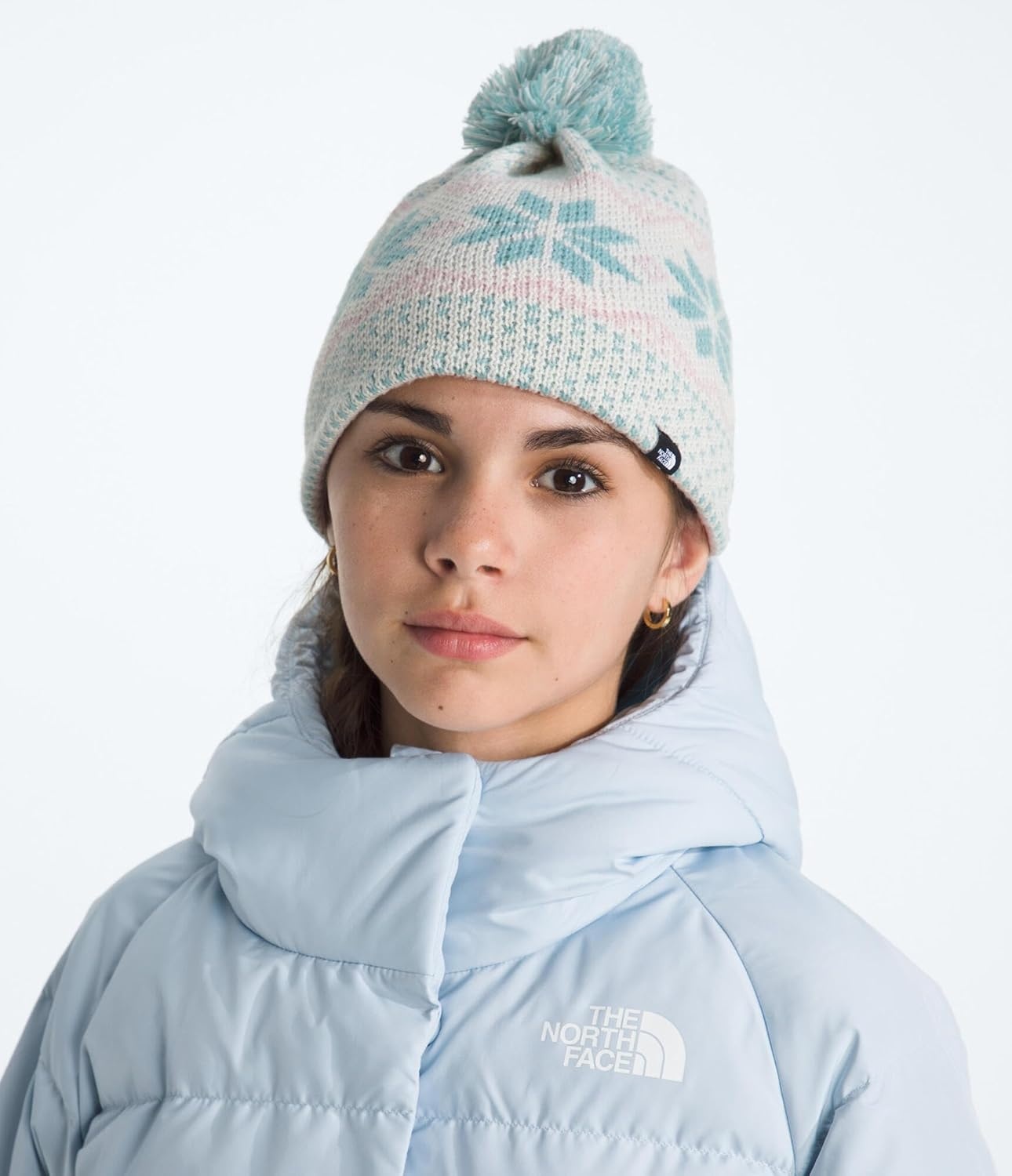 image:imageTHE NORTH FACE Kids Cabin Ski Tuke Winter Hat With Novelty Jacquard Graphic Sustainable Fabric Removable PomWhite Dune Jacquard