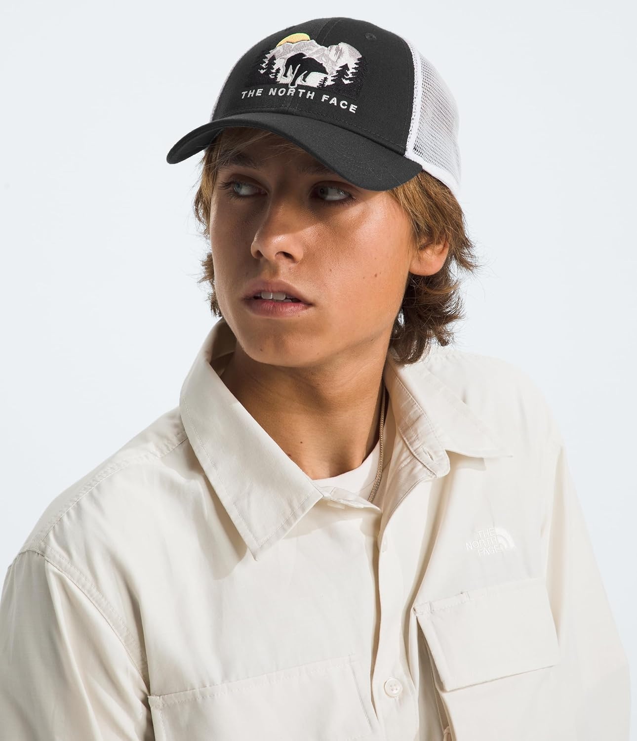 image:imageThe North Face Embroidered Mudder TruckerAsphalt GreyTnf WhiteBear Graphic