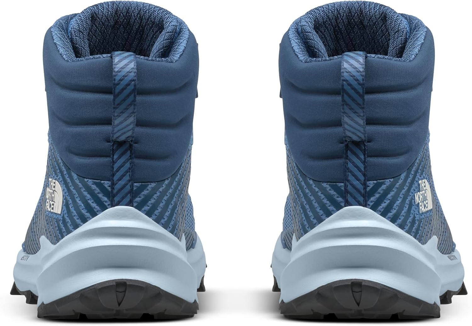 image:imageThe North Face Womens Vectiv Fastpack Mid Waterproof Hiking Shoe Rubber Outsole High Traction 4mm LugIndigo StoneShady Blue