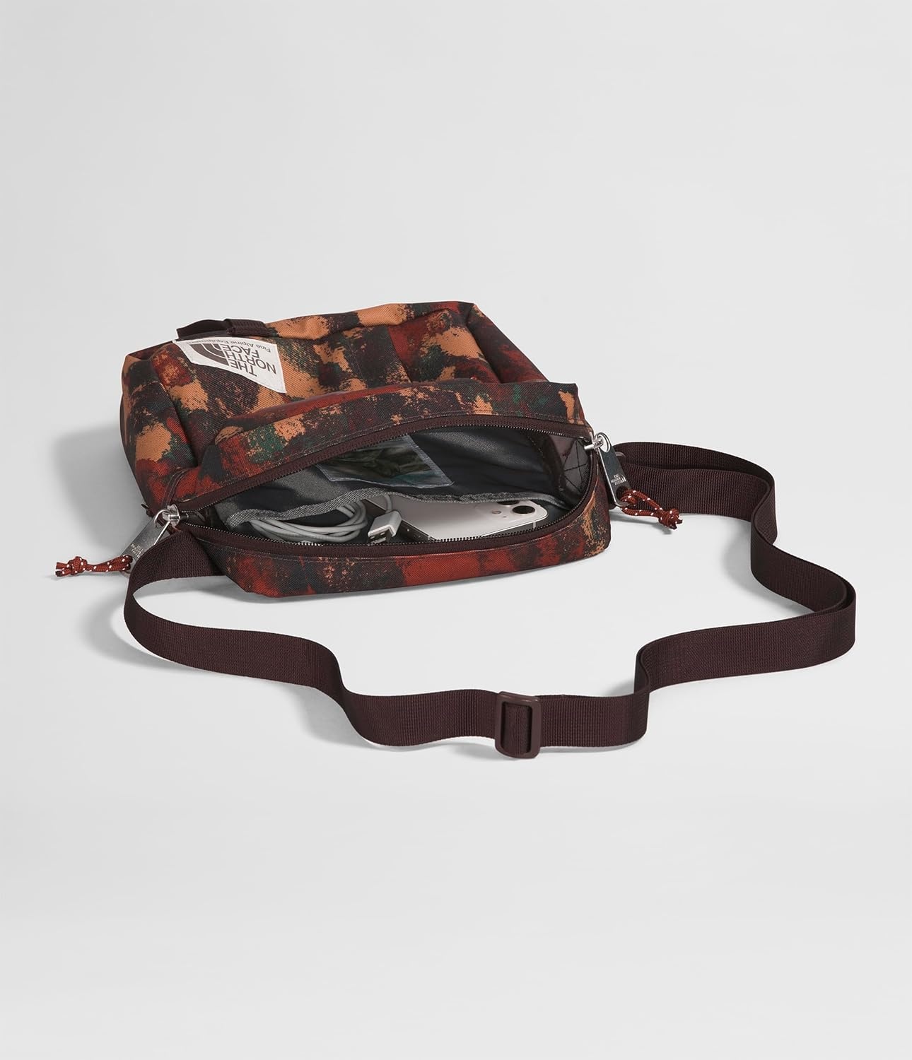 image:imageTHE NORTH FACE Berkeley Crossbody Bag Adjustable Strap Waterrepellent Finish Internal Divider amp External PocketBrandy Brown Evolved Texture PrintBrandy Brown